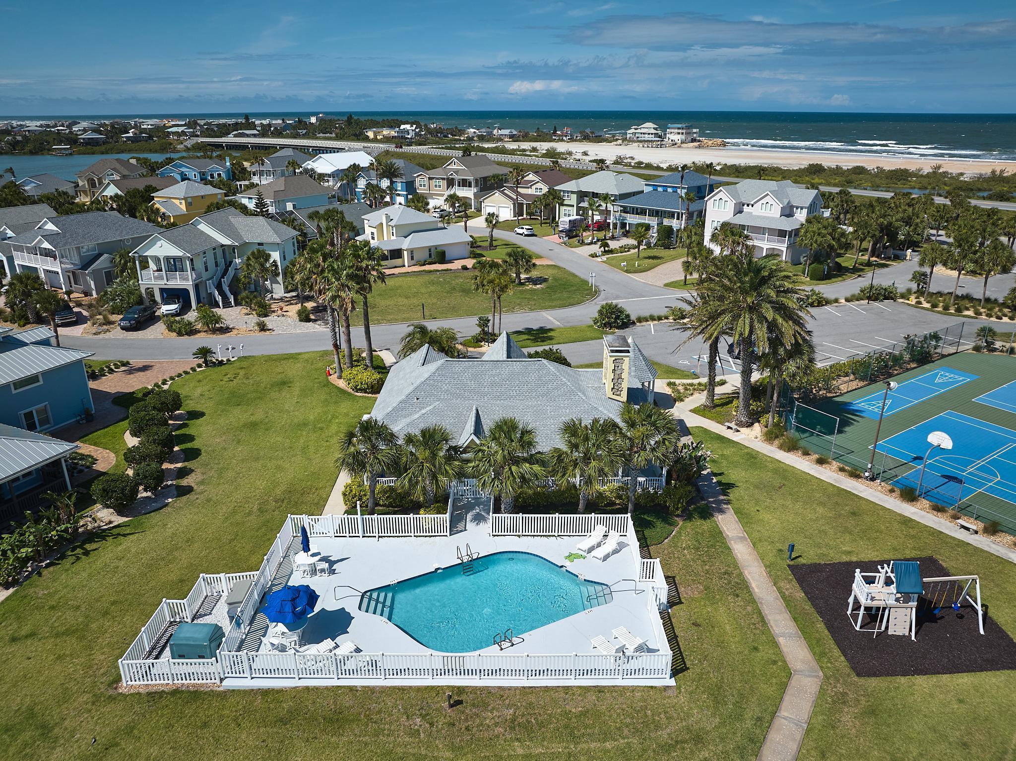 9257 July Lane St. Augustine, FL 32080 - Photo 48 of 48 an aerial view of a house with a swimming pool