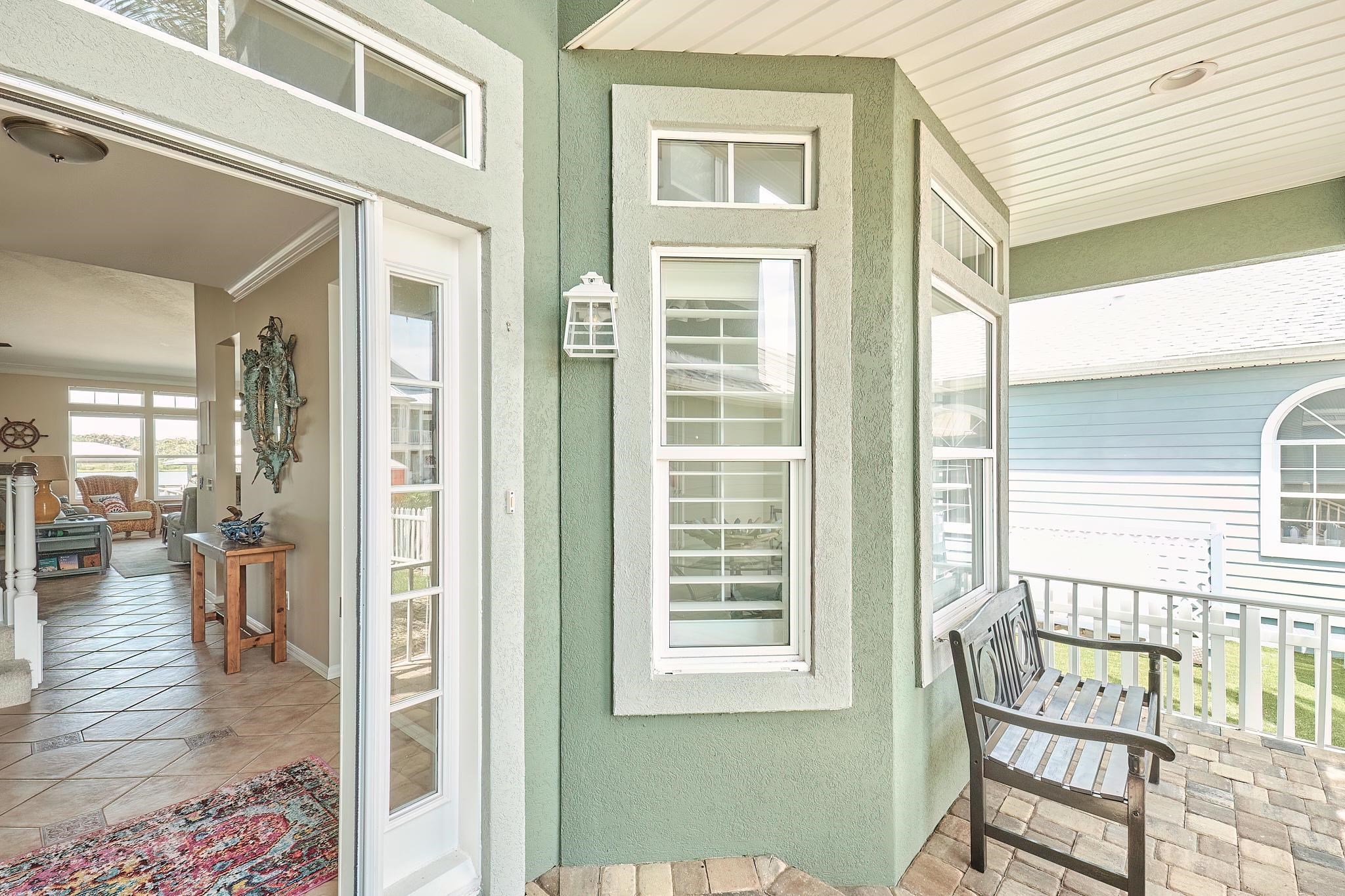 9257 July Lane St. Augustine, FL 32080 - Photo 6 of 48 a view of a livingroom with furniture and windows