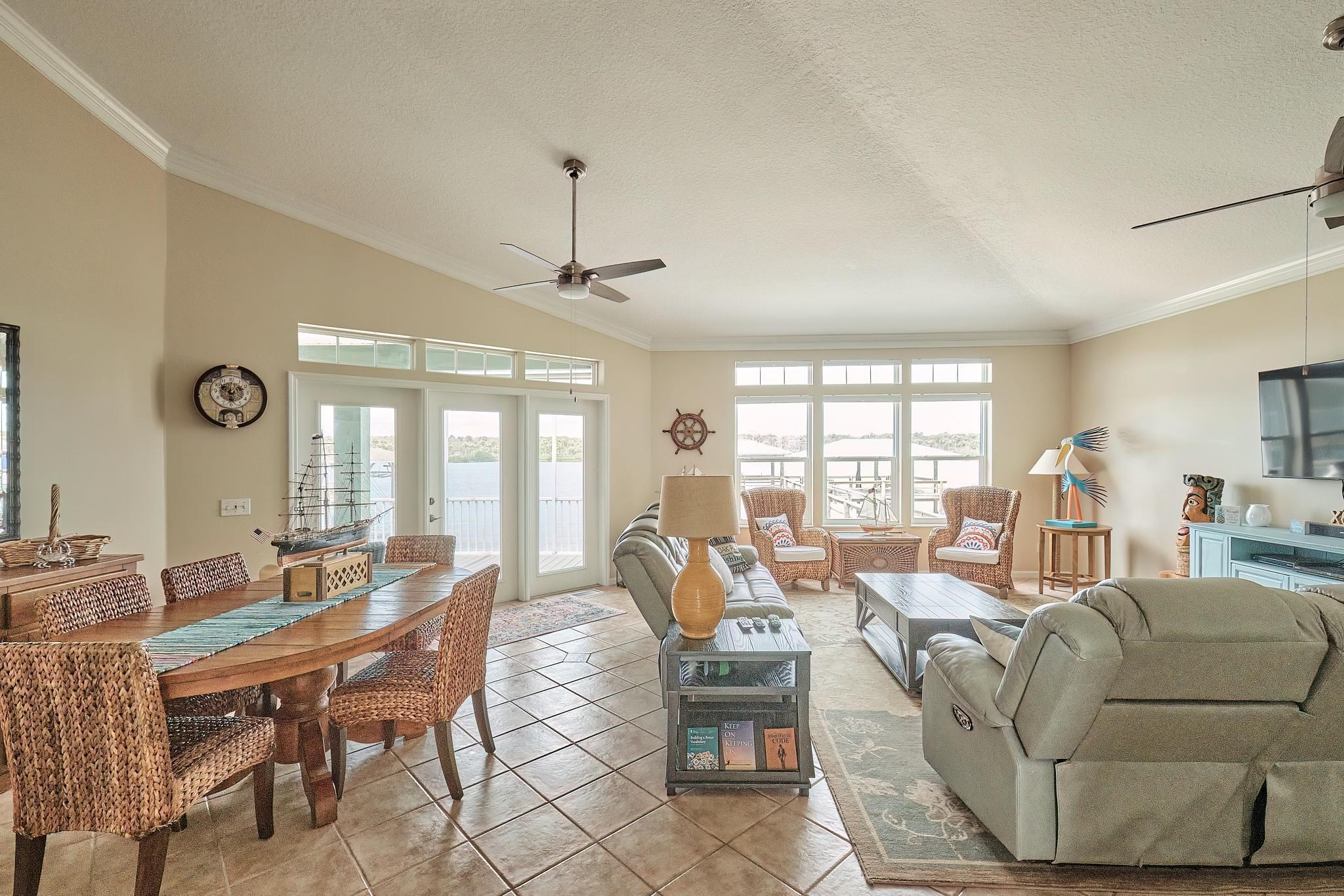 9257 July Lane St. Augustine, FL 32080 - Photo 8 of 48 a living room with furniture and a large window