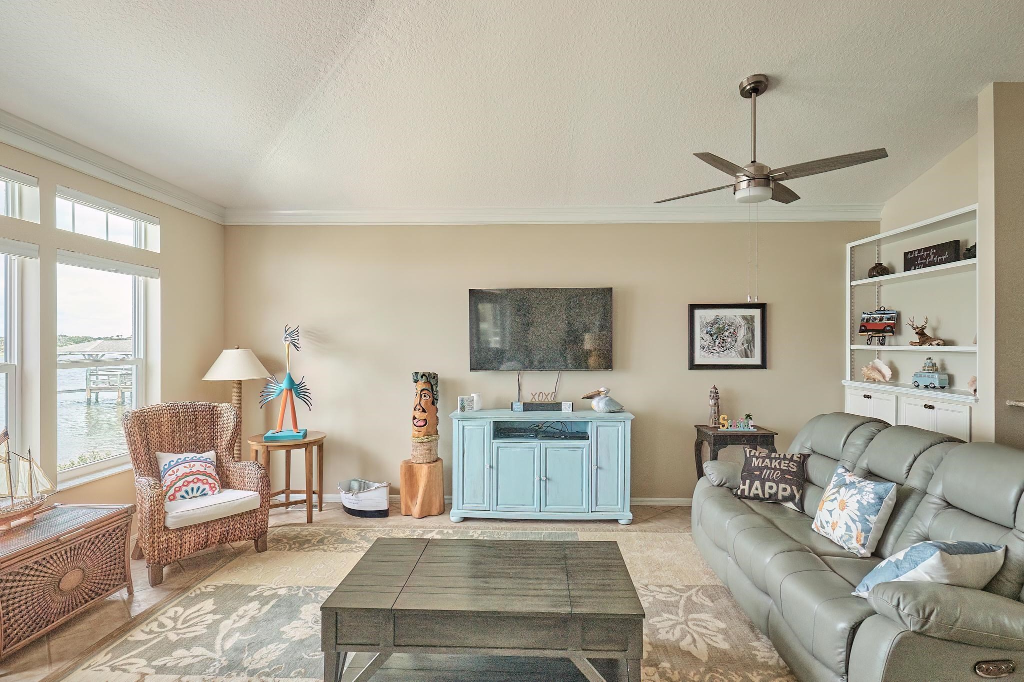 9257 July Lane St. Augustine, FL 32080 - Photo 10 of 48 a living room with furniture and a window