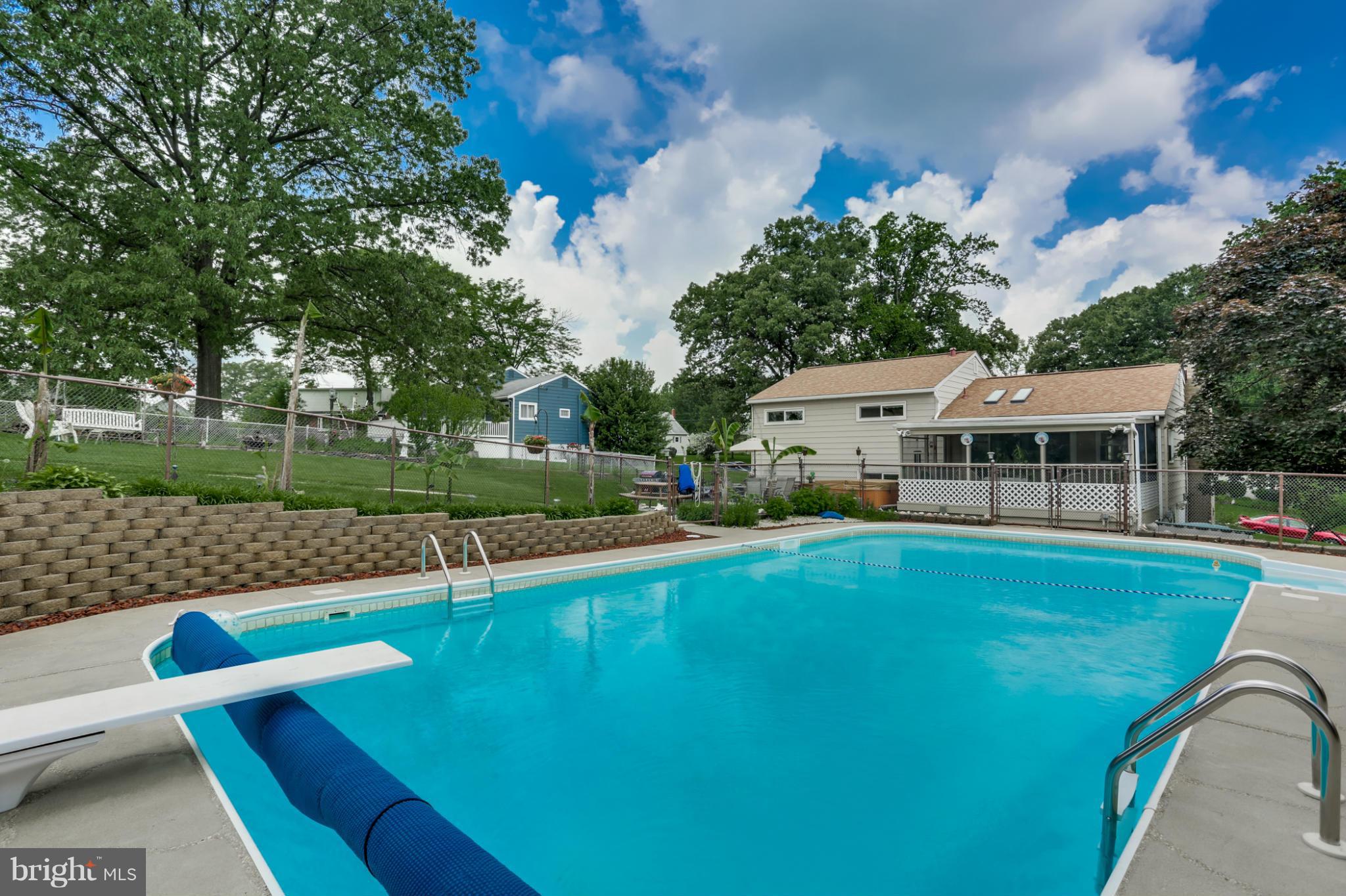 449 West Maple Road Linthicum Heights, MD 21090 - Photo 2 of 30 a view of a house with swimming pool and yard