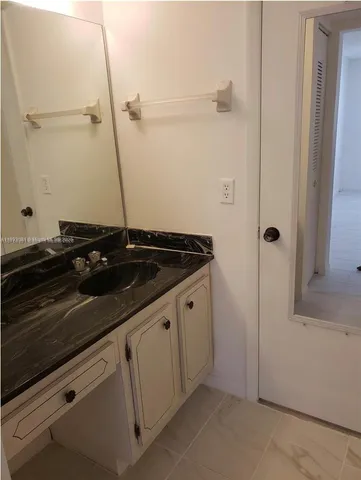 a bathroom with a toilet and a sink
