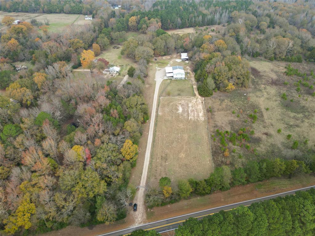 3815 Fm 2088 Quitman, TX 75783 - Photo 24 of 24 a aerial view of a house with a yard