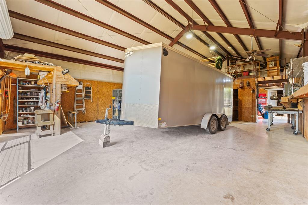 4451 Shiloh Road Midlothian, TX 76065 - Photo 28 of 39 Barn has a concrete floor and is fully insulated. There is also tack room, sink, and LED lighting throughout the inside of the building.