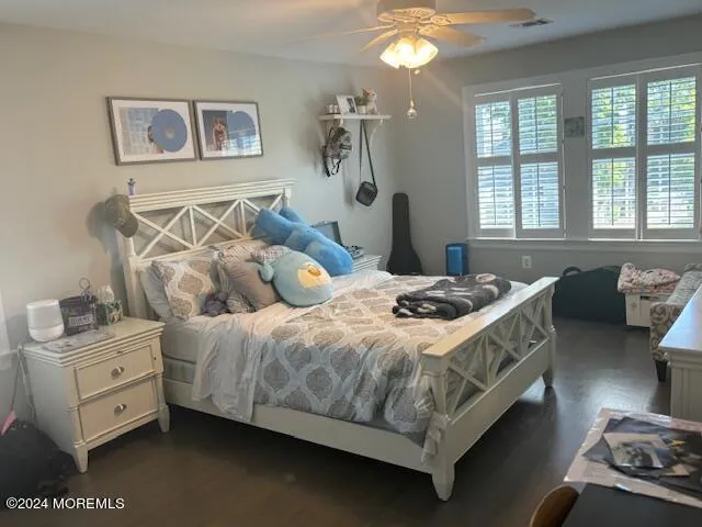 a living room with couch and window