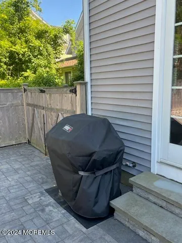 a dining room with a window table and chairs