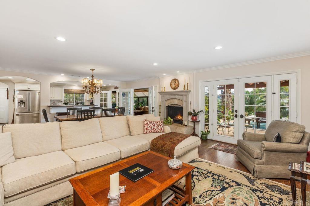 3433 Royal Road Vista, CA 92084 - Photo 12 of 45 a living room with furniture and a fireplace