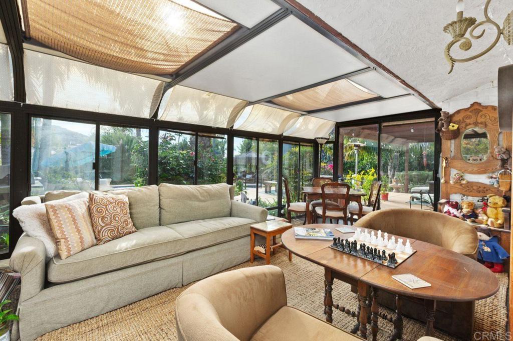 3433 Royal Road Vista, CA 92084 - Photo 17 of 45 a living room with furniture and a large window
