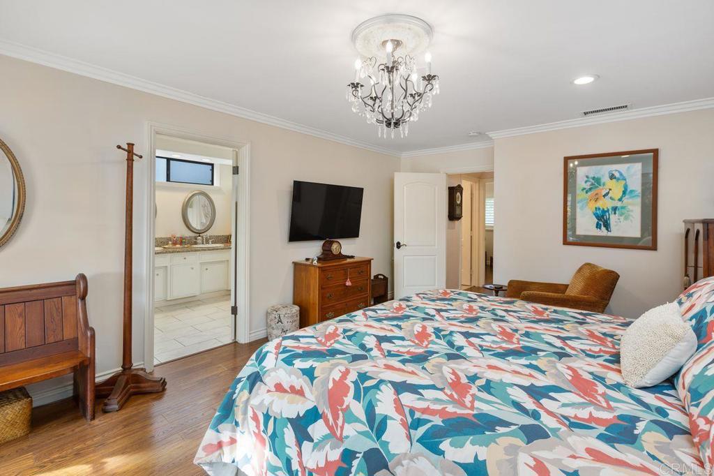 3433 Royal Road Vista, CA 92084 - Photo 21 of 45 a bedroom with a bed and a flat screen tv