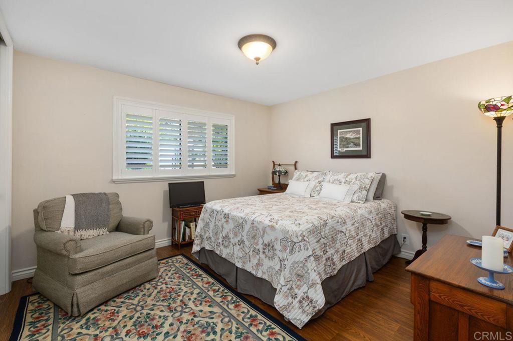 3433 Royal Road Vista, CA 92084 - Photo 24 of 45 a bedroom with bed couch and window
