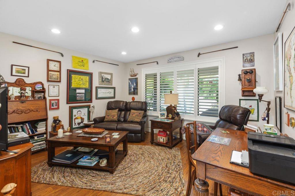 3433 Royal Road Vista, CA 92084 - Photo 27 of 45 a living room with furniture large window and flat screen tv