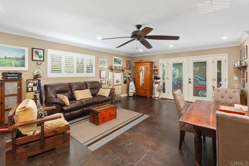3433 Royal Road Vista, CA 92084 - Photo 28 of 45 a living room with furniture and a large window