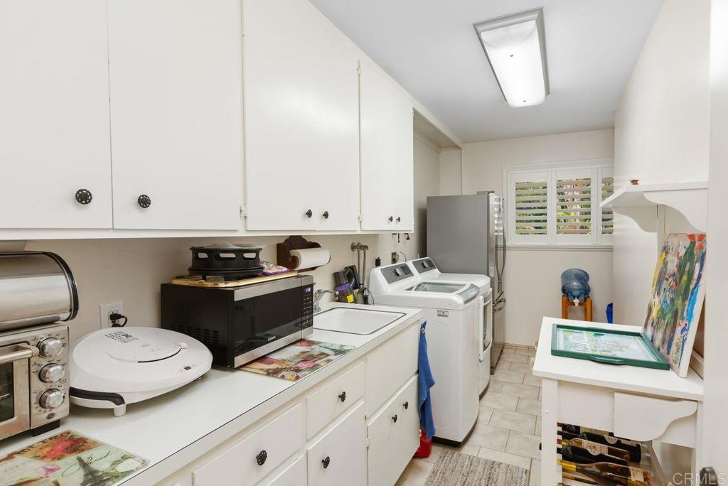 3433 Royal Road Vista, CA 92084 - Photo 38 of 45 a view of kitchen with sink and wooden floor