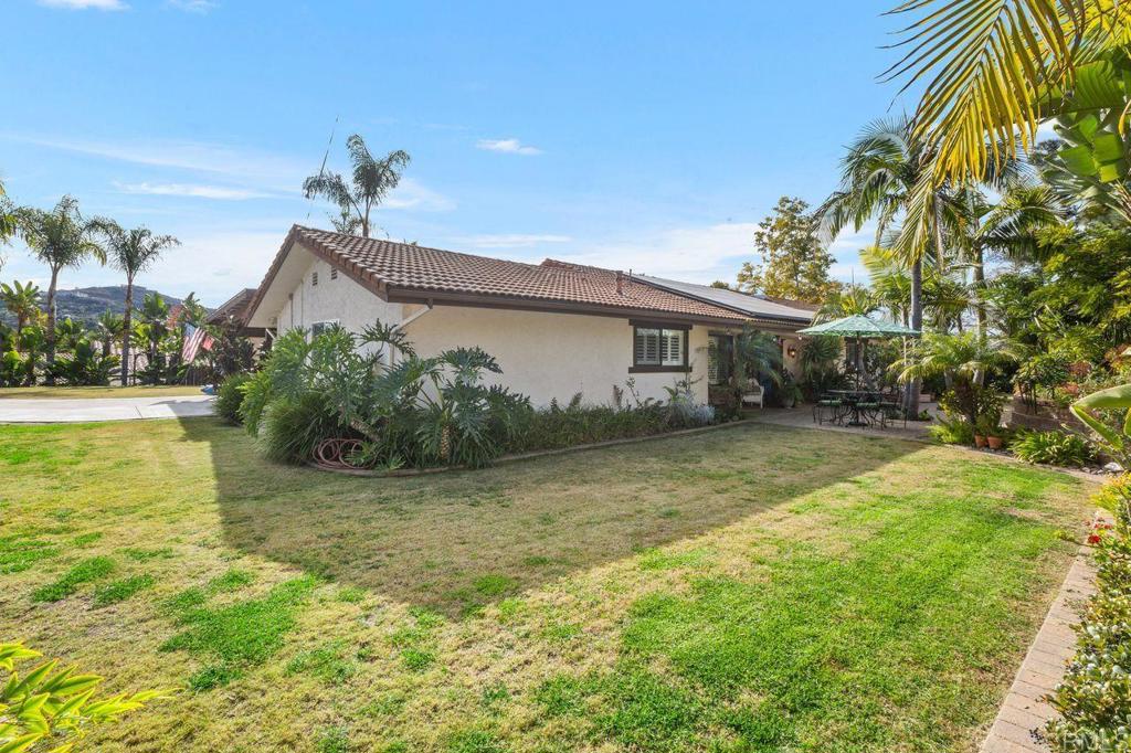 3433 Royal Road Vista, CA 92084 - Photo 41 of 45 a view of a house with a yard and swimming pool