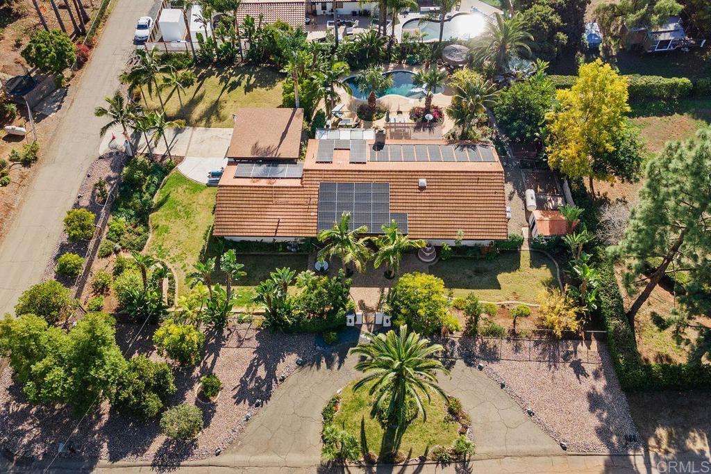 3433 Royal Road Vista, CA 92084 - Photo 44 of 45 an aerial view of a house with a yard and a garden