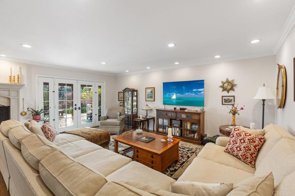 3433 Royal Road Vista, CA 92084 - Photo 10 of 45 a living room with furniture and a flat screen tv