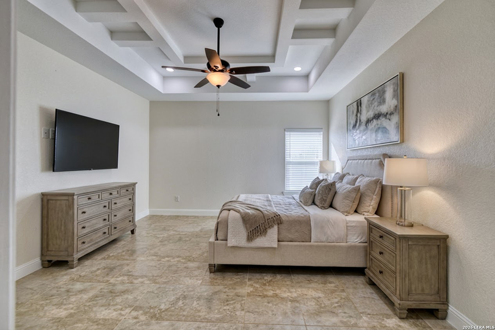 207 Riverside Drive Uvalde, TX 78801 - Photo 27 of 37 a bedroom with furniture and flat screen tv