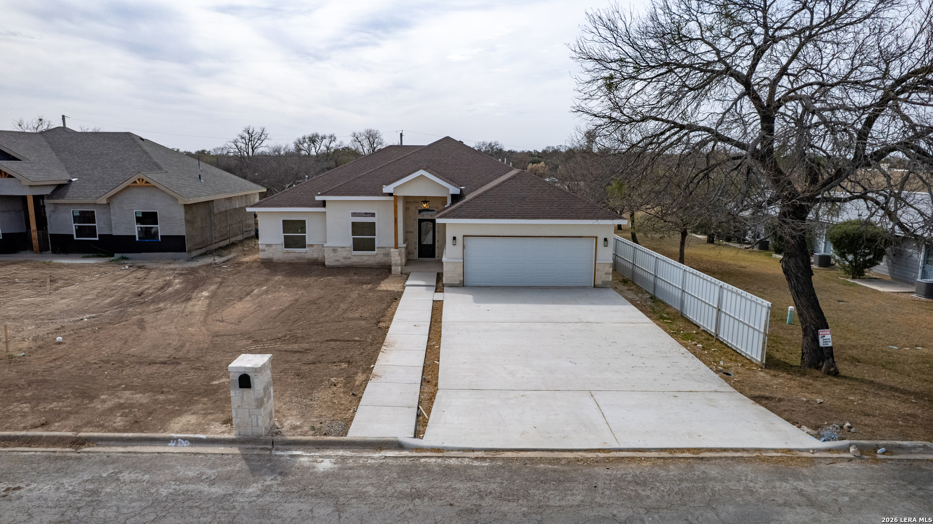207 Riverside Drive Uvalde, TX 78801 - Photo 33 of 37 a view of a house with a yard