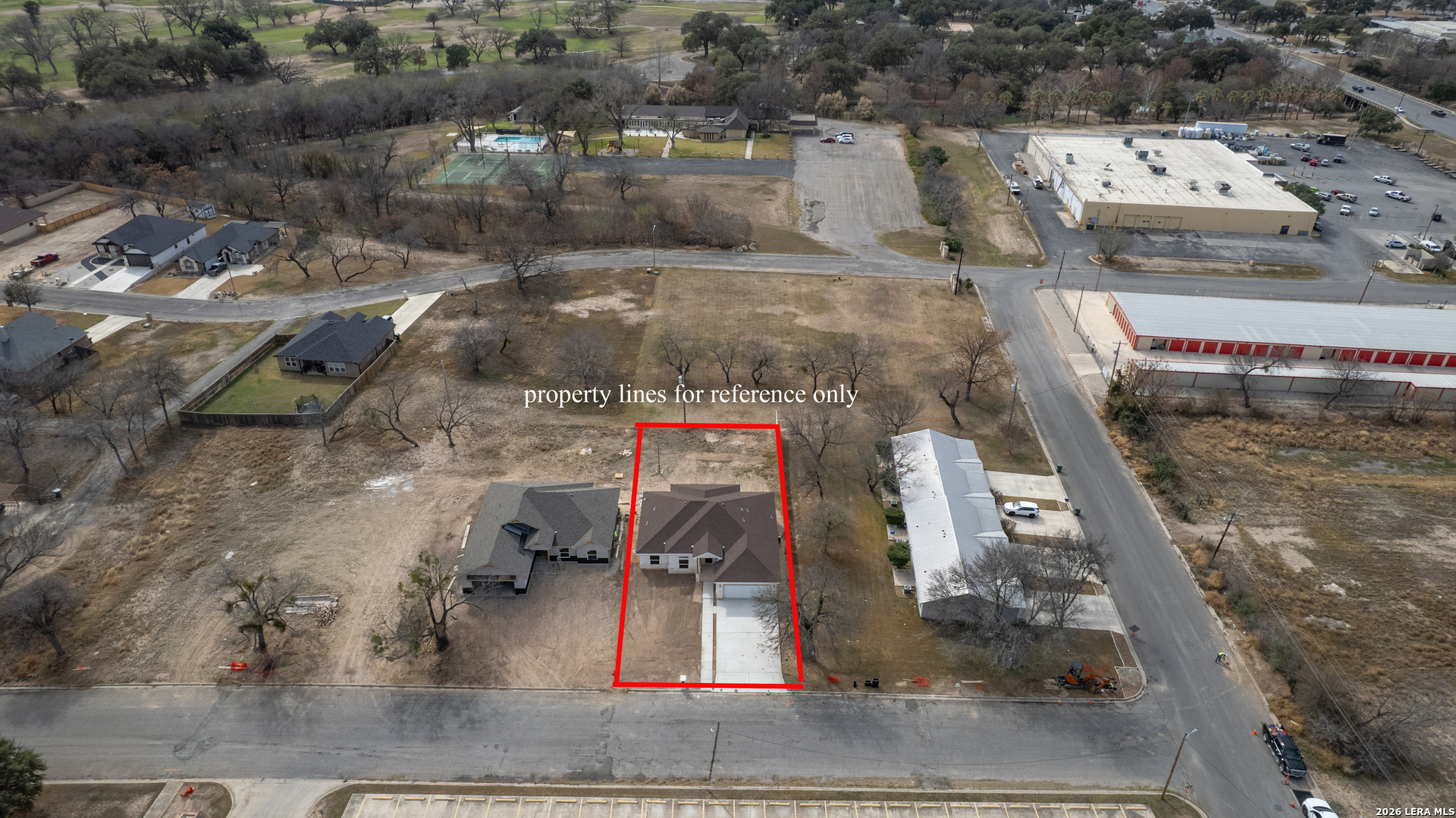 207 Riverside Drive Uvalde, TX 78801 - Photo 35 of 37 an aerial view of a houses with outdoor space