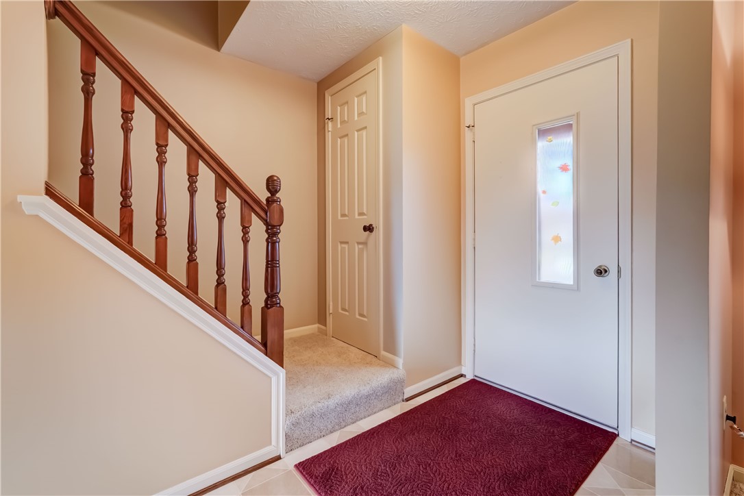 22 Pennicott Circle Penfield, NY 14526 - Photo 11 of 44 Enter the front door- head up the stairs to the ri