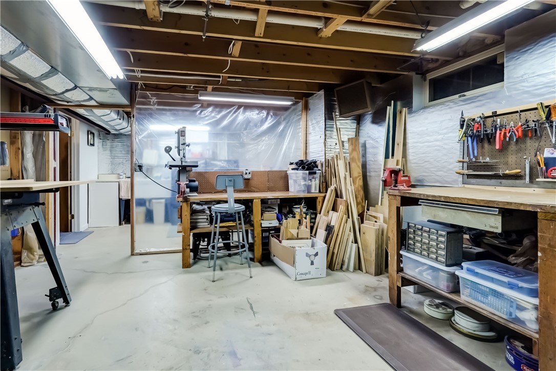 22 Pennicott Circle Penfield, NY 14526 - Photo 44 of 44 Workshop area in basement.