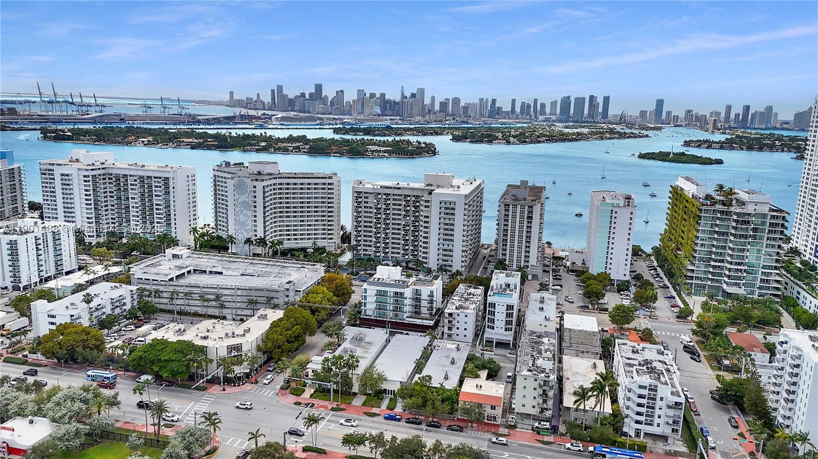 1215 West Avenue, Unit 605 Miami Beach, FL 33139 - Photo 18 of 19 a view of a lake with tall buildings