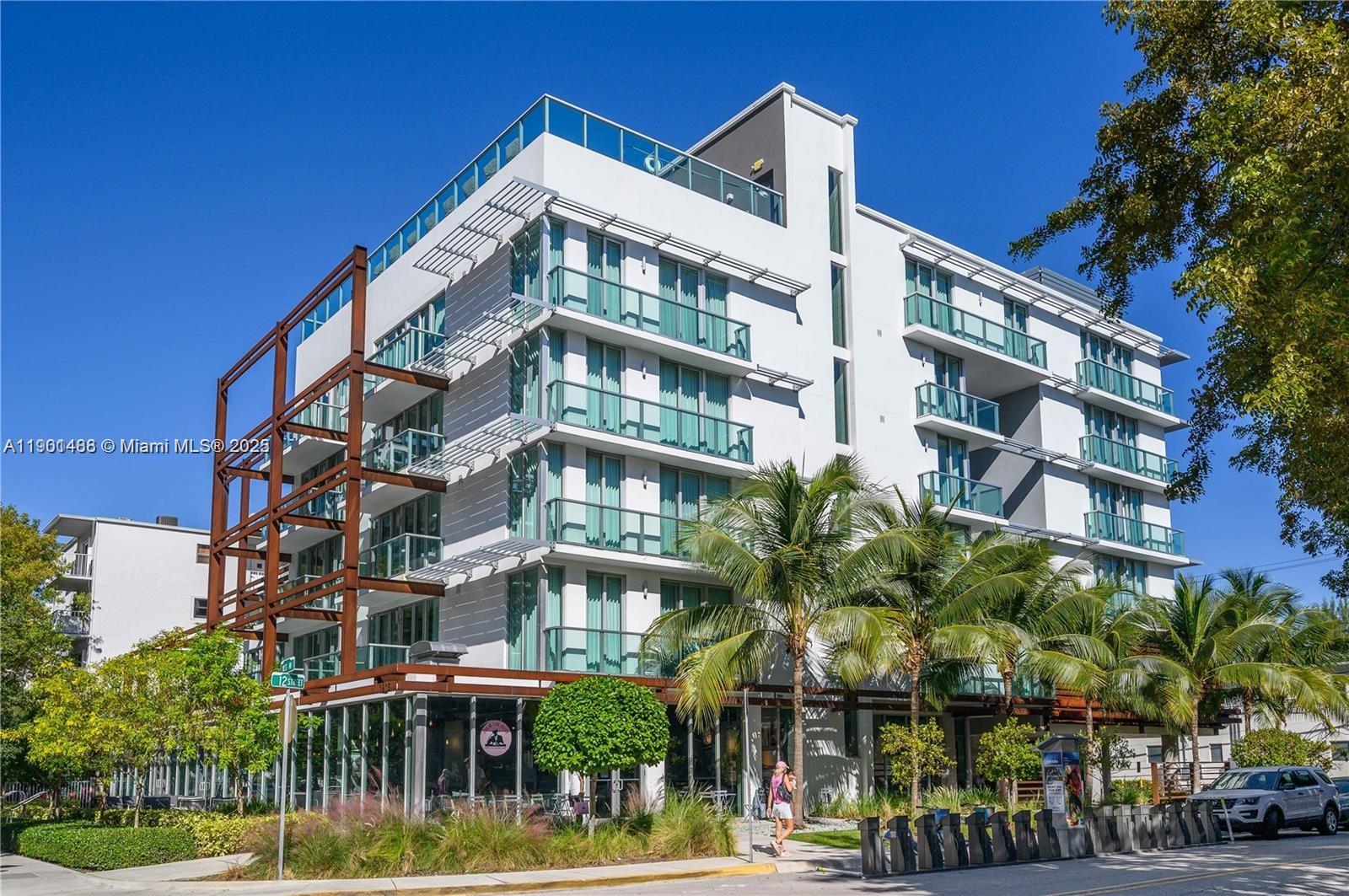 1215 West Avenue, Unit 605 Miami Beach, FL 33139 - Photo 2 of 19 a front view of a building with street view