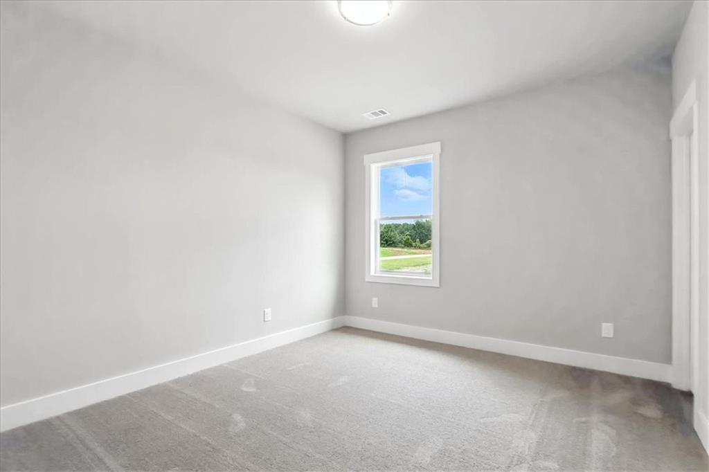 95 Old Town Road Dacula, GA 30019 - Photo 53 of 74 an empty room with windows