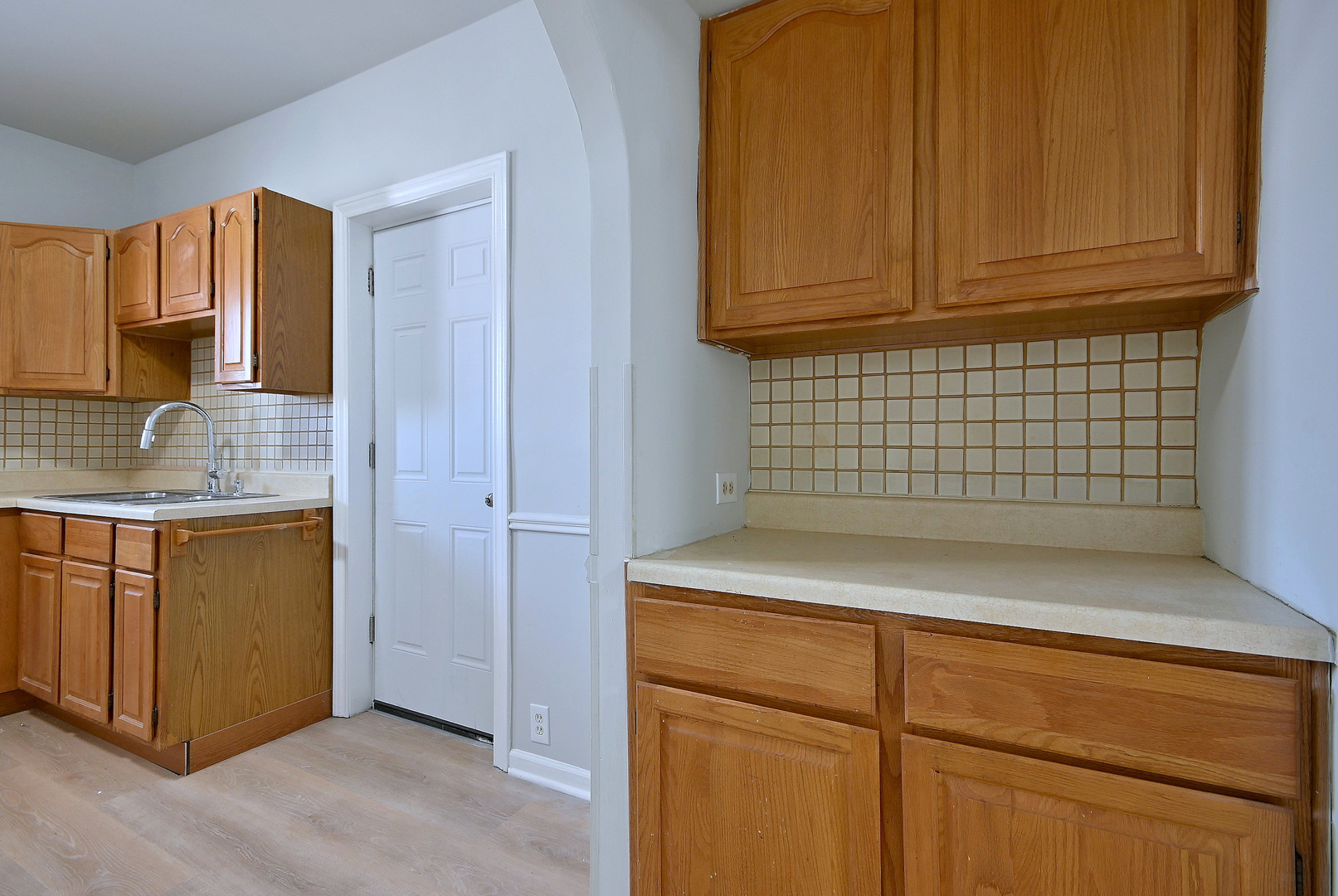 7625 Monroe Street Forest Park, IL 60130 - Photo 41 of 52 a kitchen with stainless steel appliances granite countertop a sink and cabinets