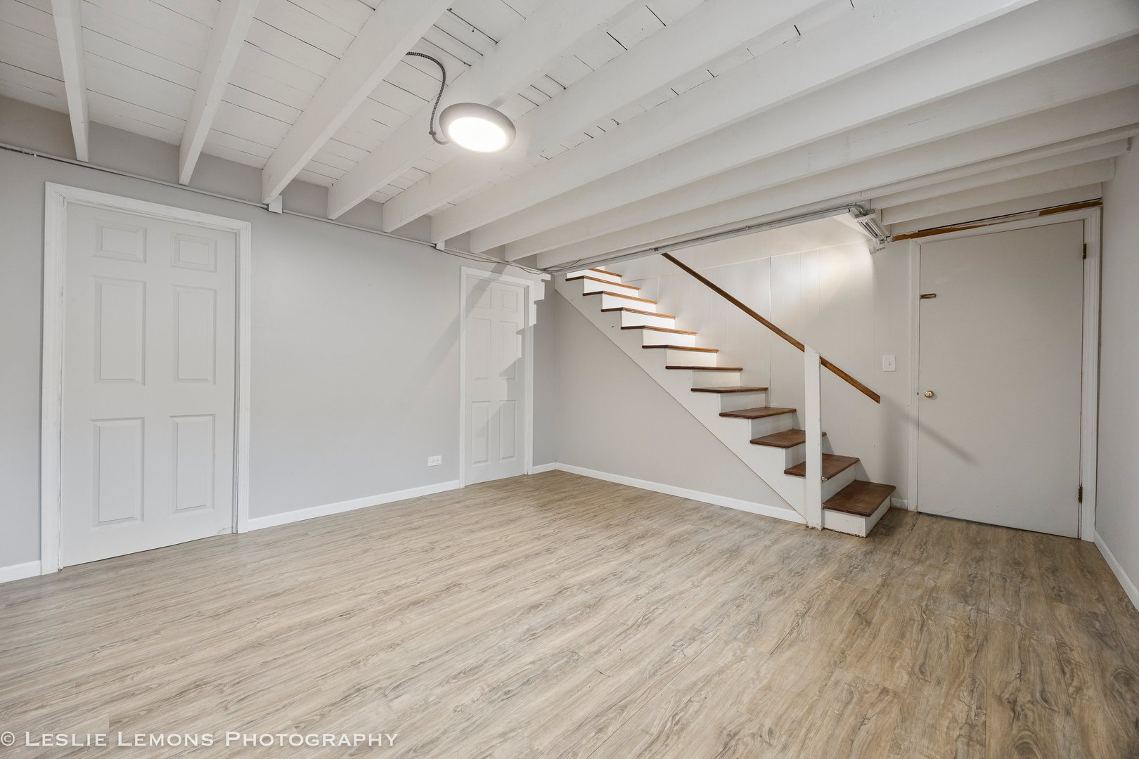 629 South Main Street, Unit BACK Naperville, IL 60540 - Photo 14 of 29 a view of an empty room with wooden floor