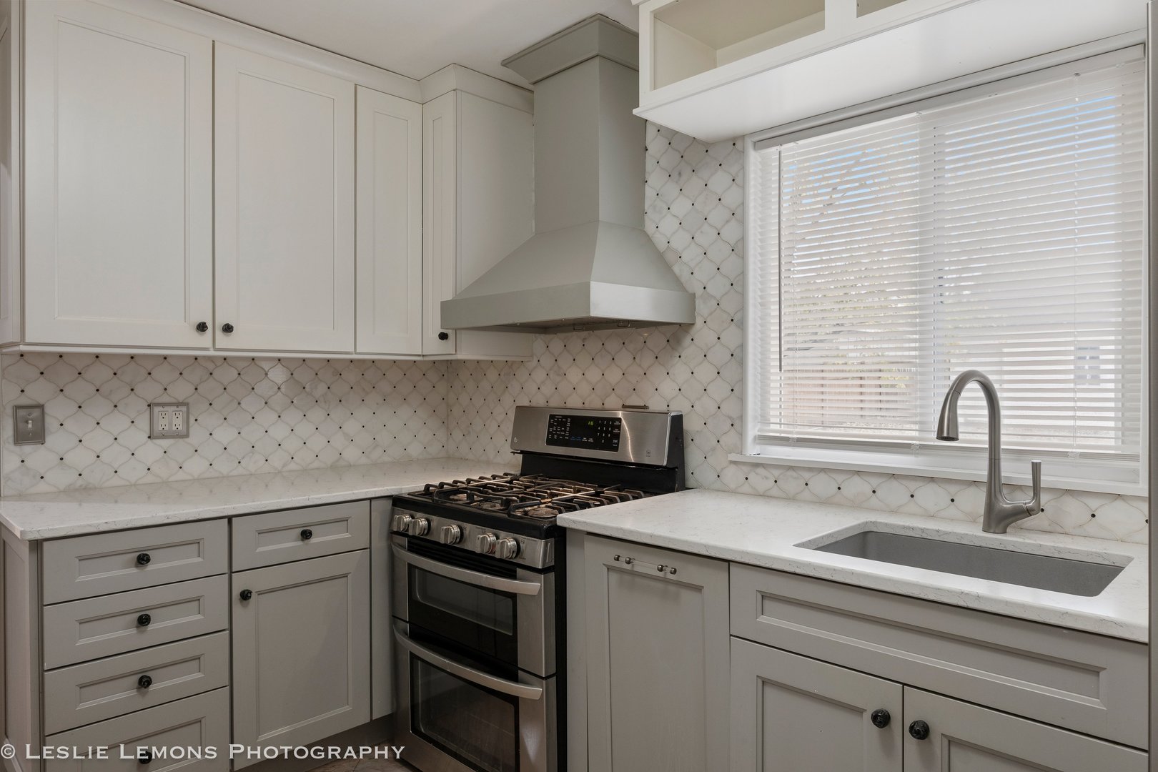 629 South Main Street, Unit BACK Naperville, IL 60540 - Photo 9 of 29 a kitchen with cabinets appliances and a window