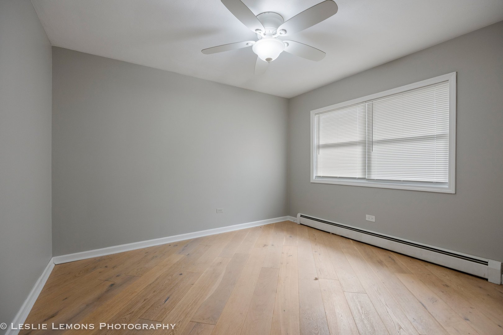 629 South Main Street, Unit BACK Naperville, IL 60540 - Photo 10 of 29 wooden floor in an empty room with a window
