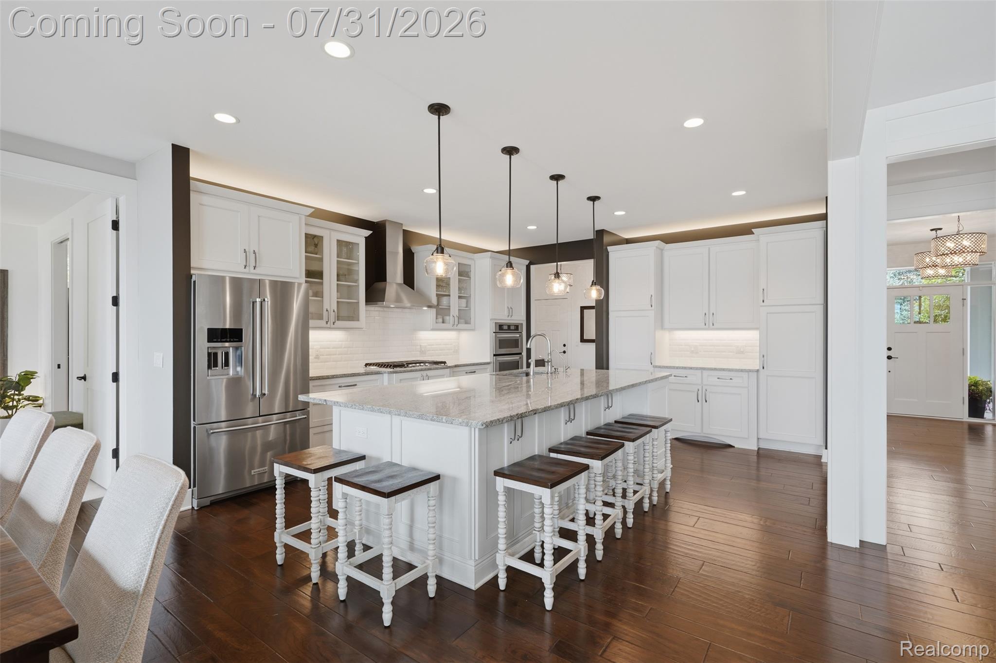 8303 Hilton Road Brighton, MI 48114 - Photo 13 of 72 large kitchen island has plenty of bar seating and extra storage space