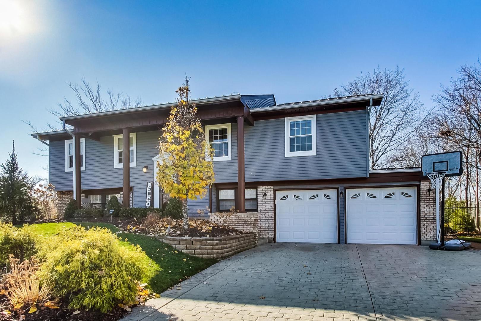 34 Timber Hill Road Buffalo Grove, IL 60089 - Photo 2 of 37 a front view of house with yard