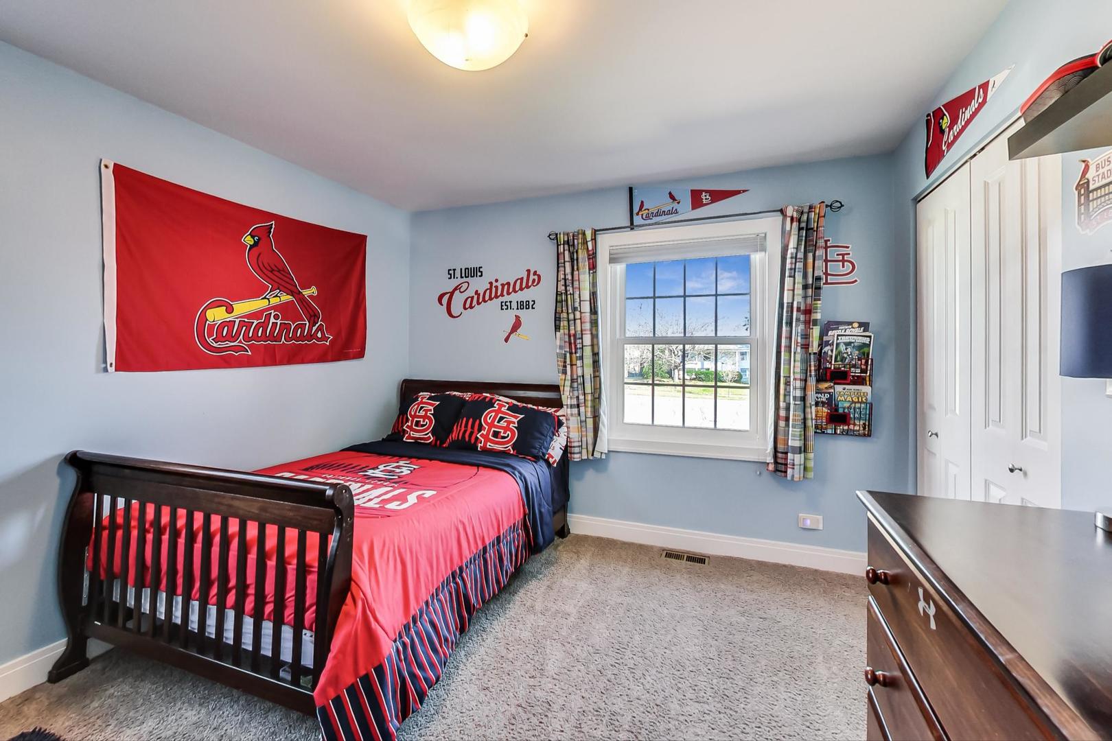 34 Timber Hill Road Buffalo Grove, IL 60089 - Photo 14 of 37 a bedroom with bed and a window