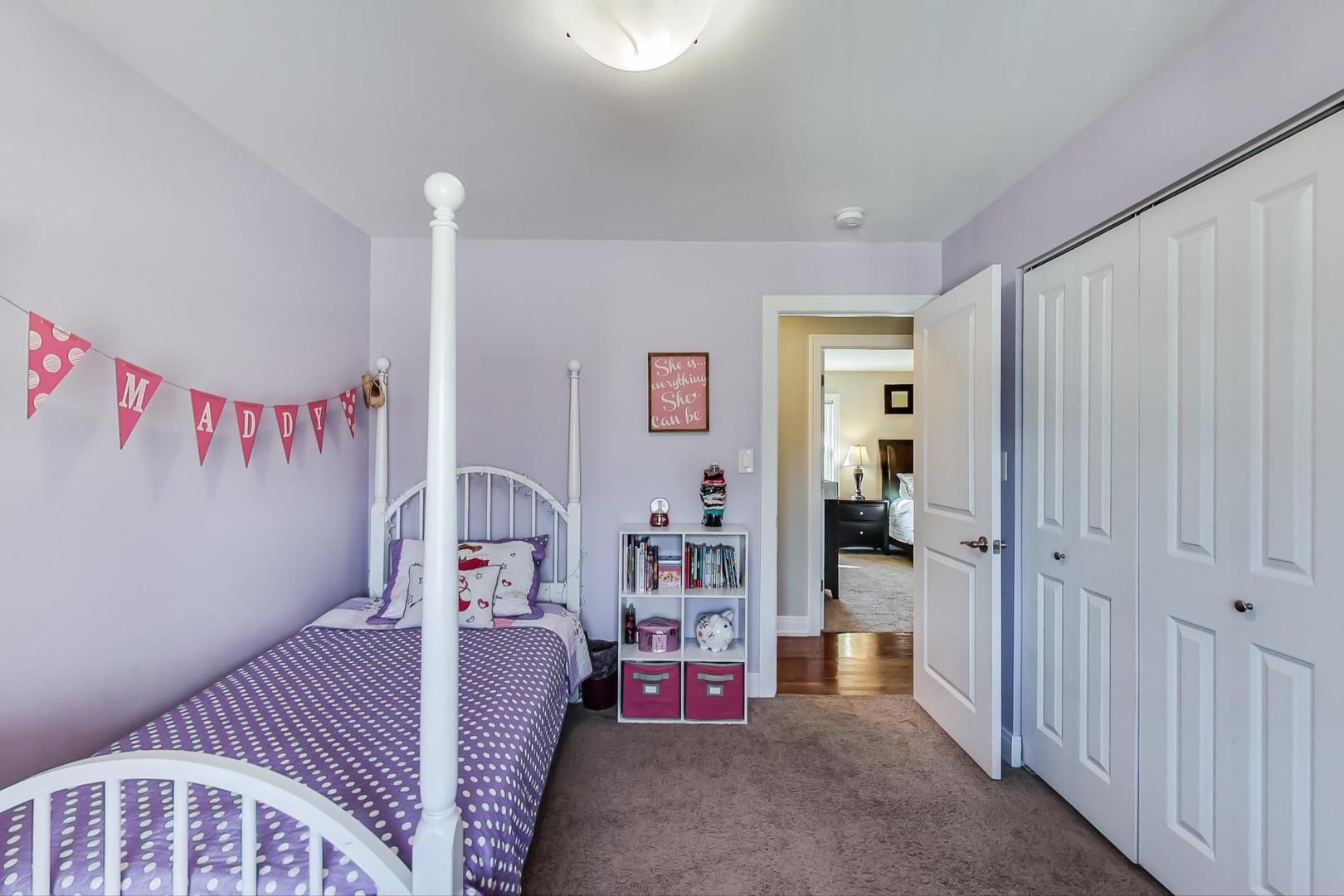 34 Timber Hill Road Buffalo Grove, IL 60089 - Photo 15 of 37 a bedroom with a bed and a couch