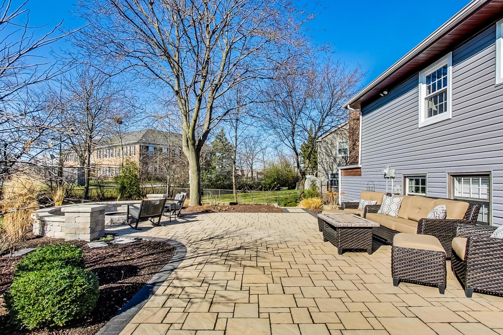 34 Timber Hill Road Buffalo Grove, IL 60089 - Photo 27 of 37 a view of a backyard with sitting area