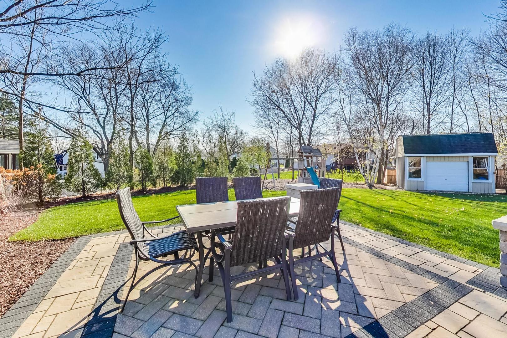 34 Timber Hill Road Buffalo Grove, IL 60089 - Photo 30 of 37 a view of a chairs and table in the garden