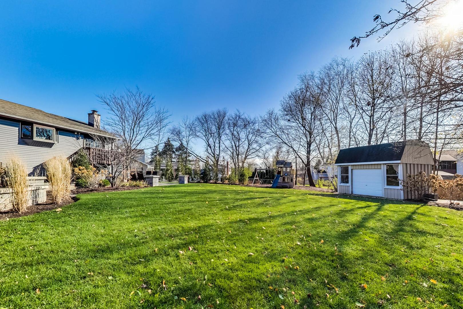 34 Timber Hill Road Buffalo Grove, IL 60089 - Photo 32 of 37 a view of a house with a big yard