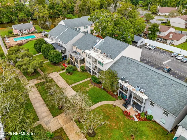 an aerial view of a house with a garden
