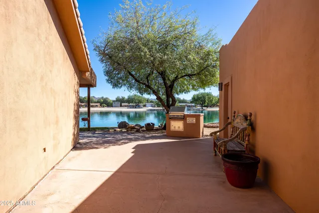 a view of a street with a large tree