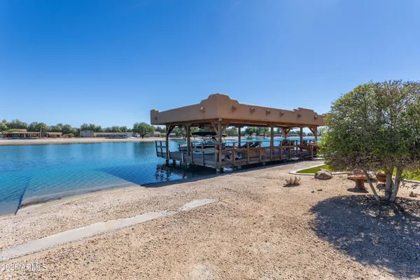 a view of a swimming pool with a patio