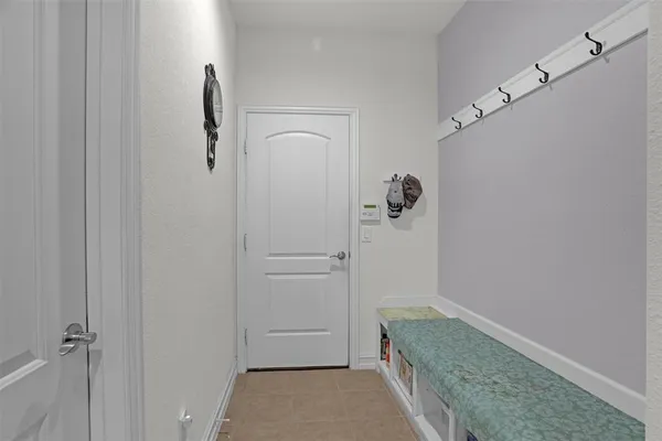 a bathroom with a shower and a sink