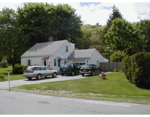 80 Greenwich Road Ware, MA 01082 - Photo 1 of 4 a view of a house with a big yard and large trees