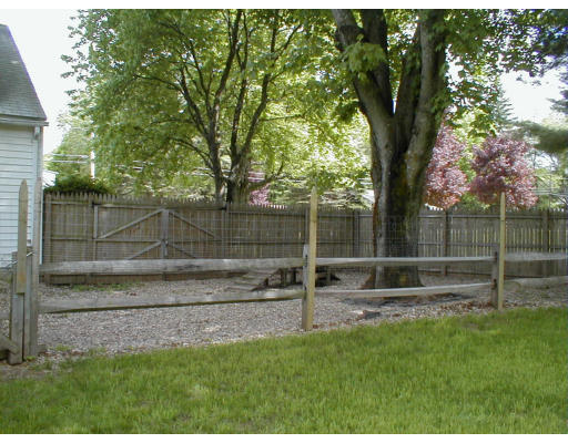 80 Greenwich Road Ware, MA 01082 - Photo 3 of 4 a backyard of a house with lots of green space