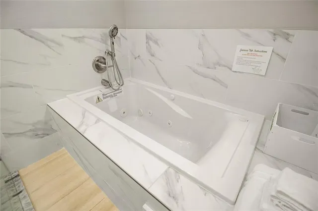 a bathroom with a bathtub