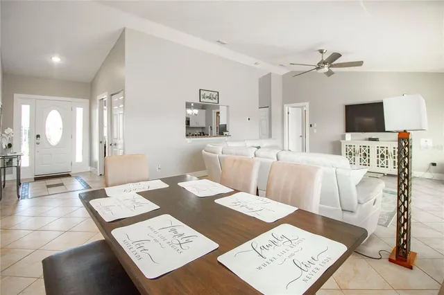 a view of a workspace with furniture and wooden floor