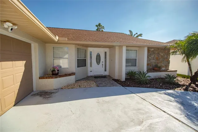 a view of a building with potted plants