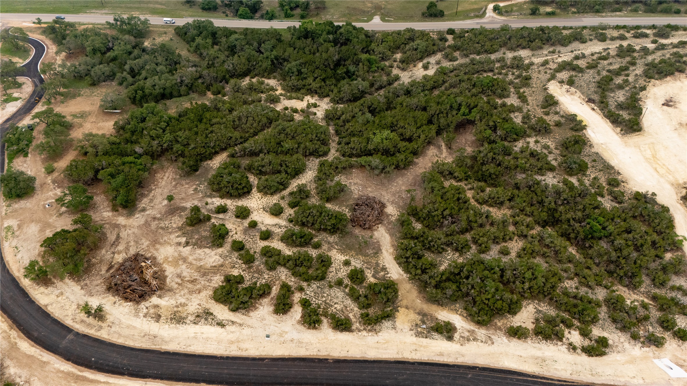 Lot 2 Ranch Road 165 Dripping Springs, TX 78620 - Photo 3 of 13 Expansive acreage featuring mature trees and partial clearing