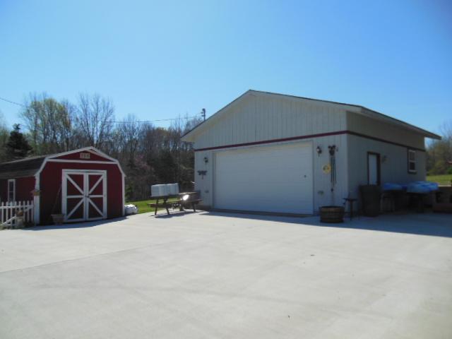 180 Batson Road Cunningham, TN 37052 - Photo 17 of 20 DETACHED 2-CAR GARAGE/WORKSHOP PLUS GARDEN SHED